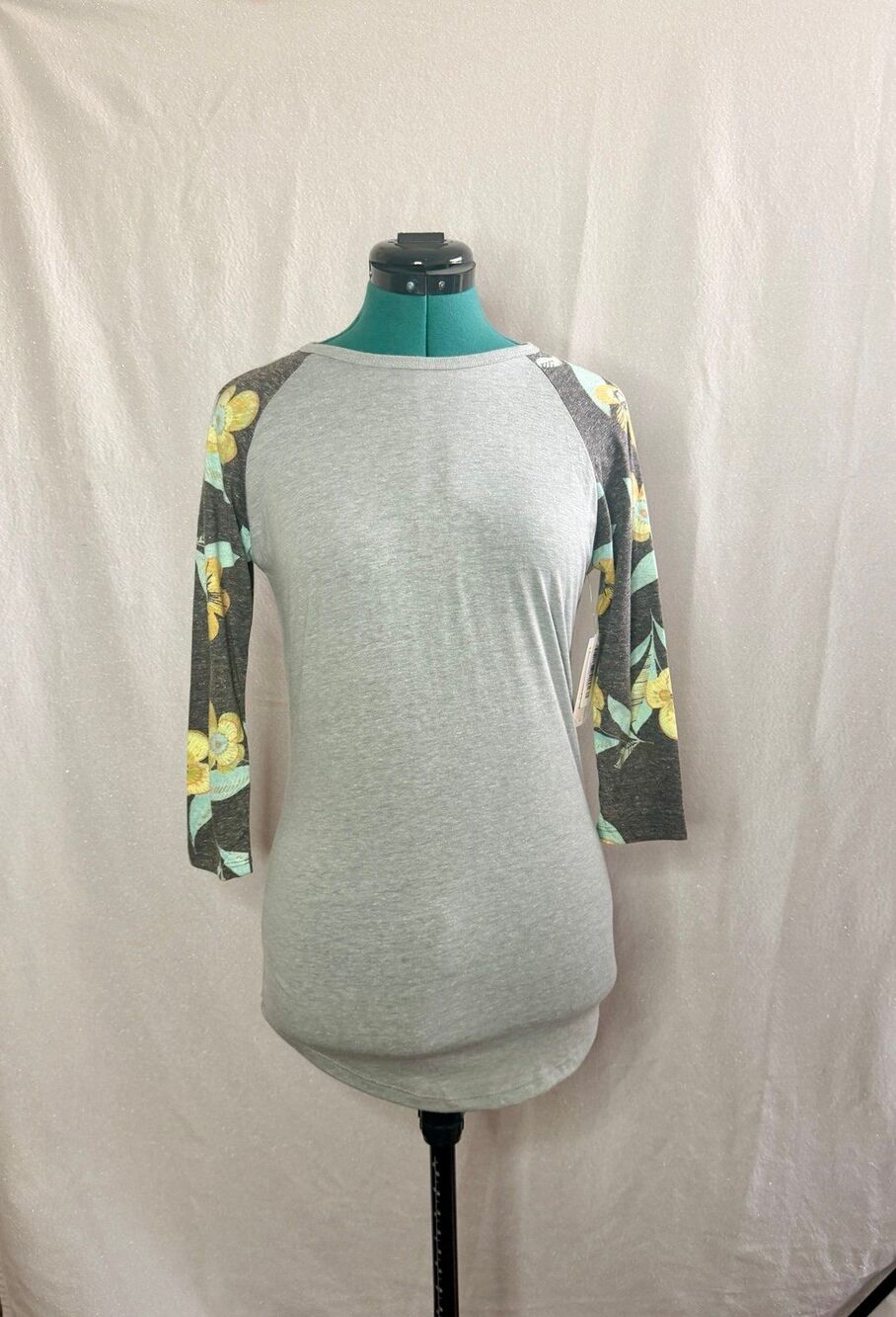 NWT Lularoe Randy top size extra extra small. Brand new with tags. Size XXS.